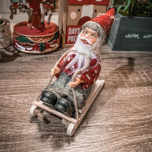 دمية سانتا كلوز بالعربه