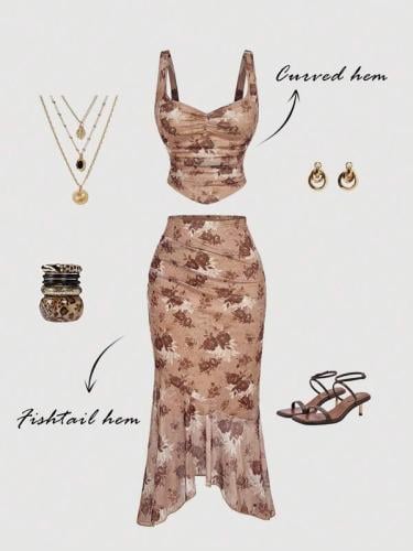 طقم دانتيل أنيق ببلوزة برقبة على شكل V وتنورة ماكسي