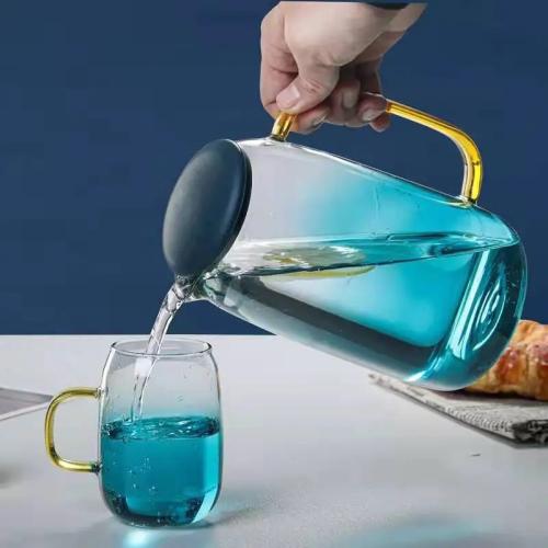 طقم قلاص زجاجي + 4 أكواب زجاج لون أزرق