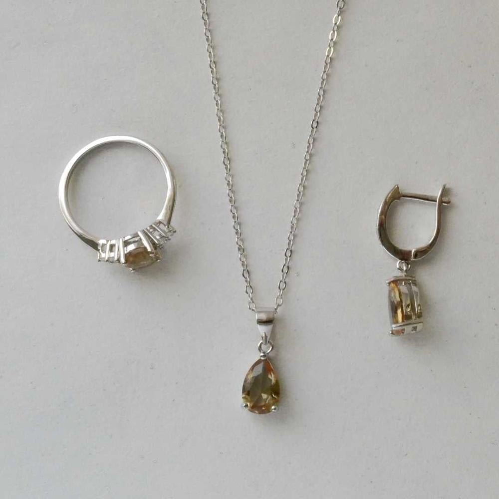 [E008] حلق حجر الزلتانايت (متغير اللون) - فضة عيار 925