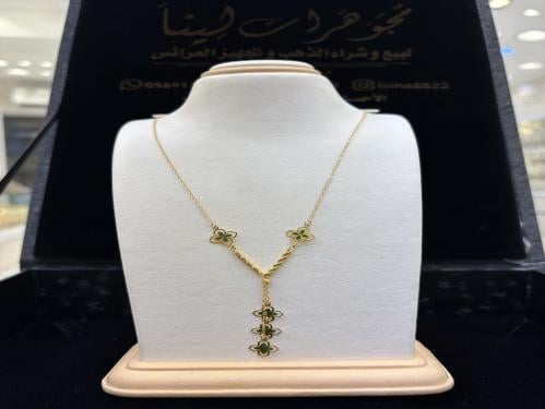 عقد ورد الزمرد ذهب عيار21