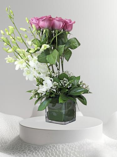 Orchid vase with roses