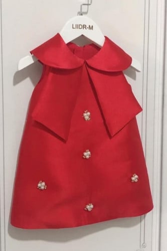 فستان اطفال مزين باللولو