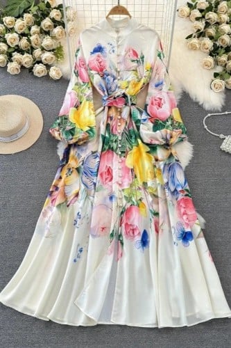 فستان نسائي أنيق من الكتان مشجر بالزهور وبأكمام منفوخة