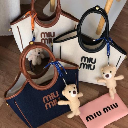 M. شنطة miu miu