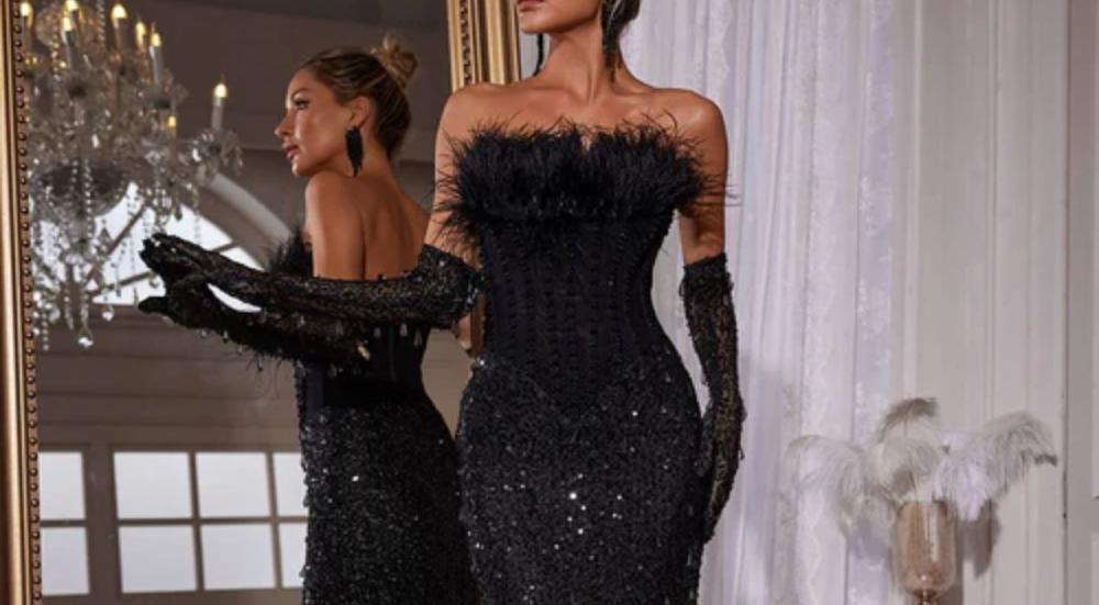 أحدث موديلات فساتين سواريه أكمام ريش بالسعودية 2026