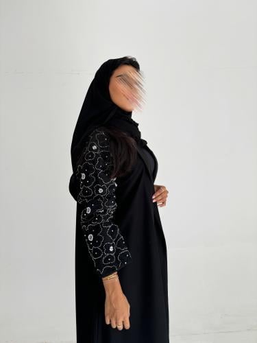 #50 عباية قماش كريب كلوش مع أكمام تل ورد شك خرز ول...