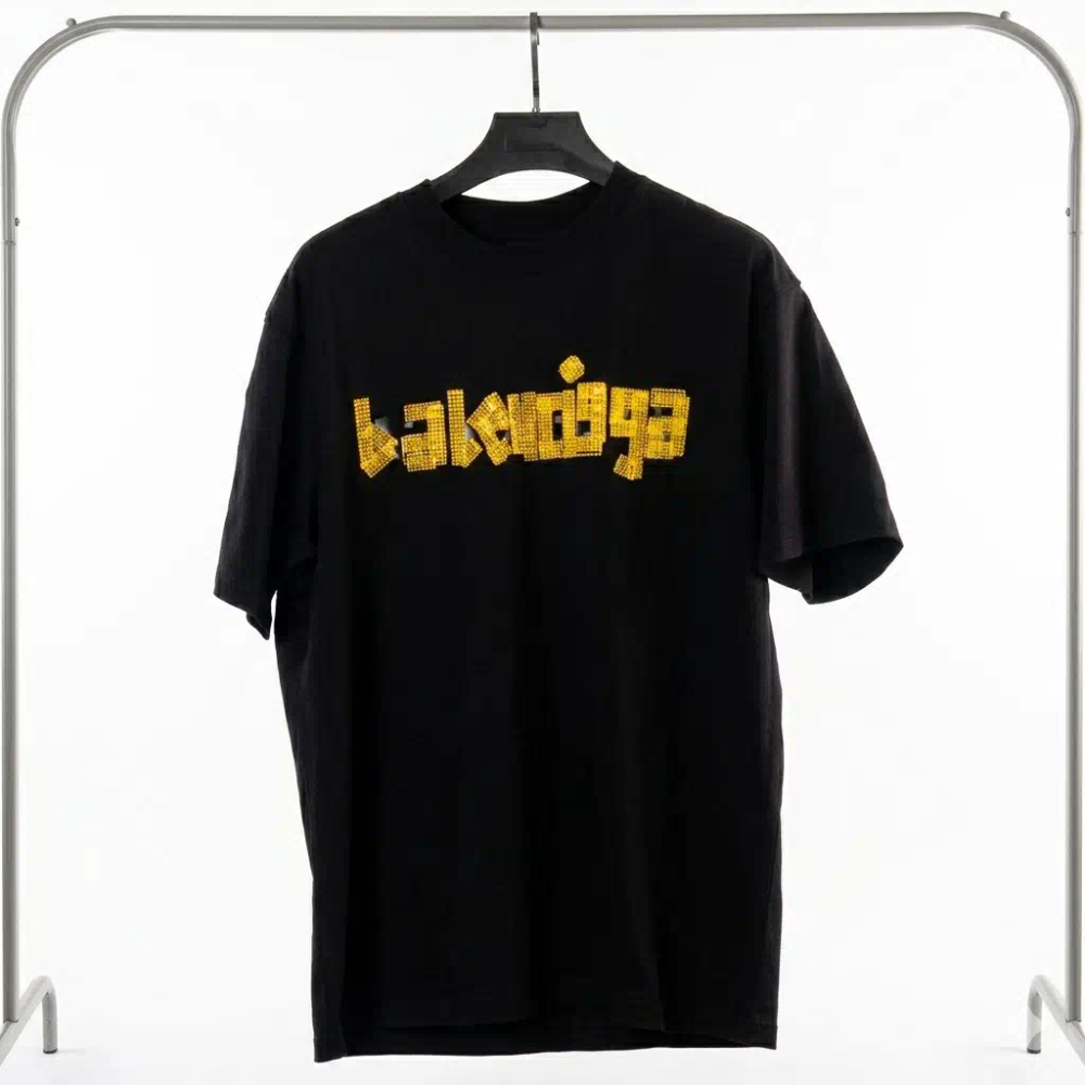 تيشيرت "بالنسياغا" بريق الغرافيتي الذهبي