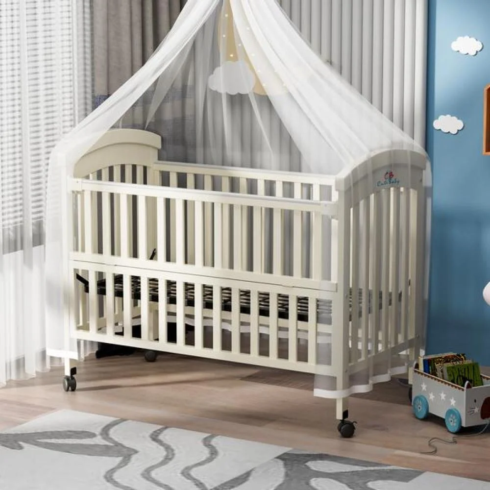 سرير أطفال خشبي بجانب سرير الأم مع ناموسية وعجلات متحركة -متجر اقتناء