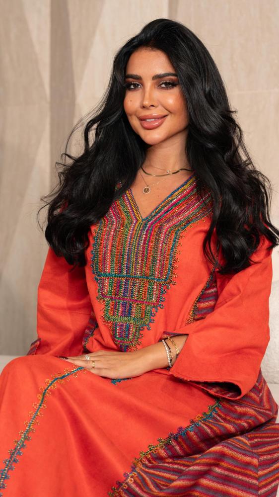 جلابية شتوية بلون برتقالي مطرزة