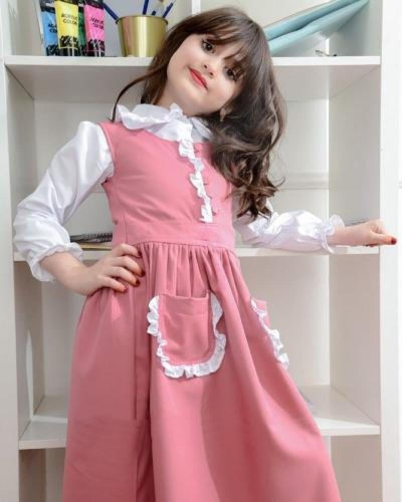 مريول الابتدائي وردي بقصة مكرمشه انيق