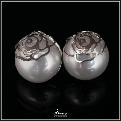 حلق فضة مع لؤلؤ فخامة وأناقة