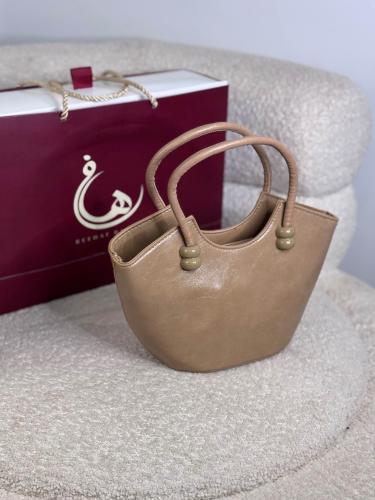شنطة يد لون كوفي