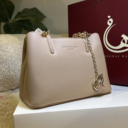 شنطه يد لون بيج