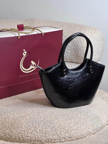شنطة يد لون اسود