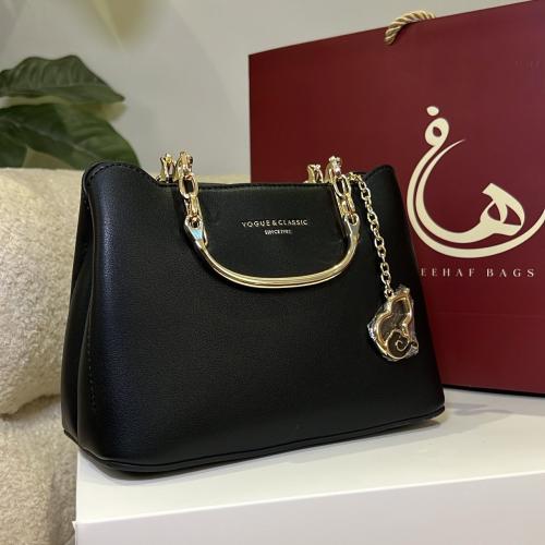 شنطة يد لون اسود