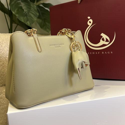 شنطه يد لون بستاشبو فاتح