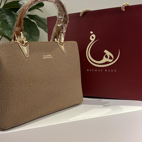 شنطه كلاسيك لون بني