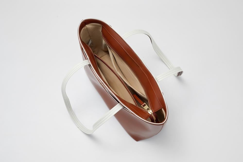 شنطه لون بني