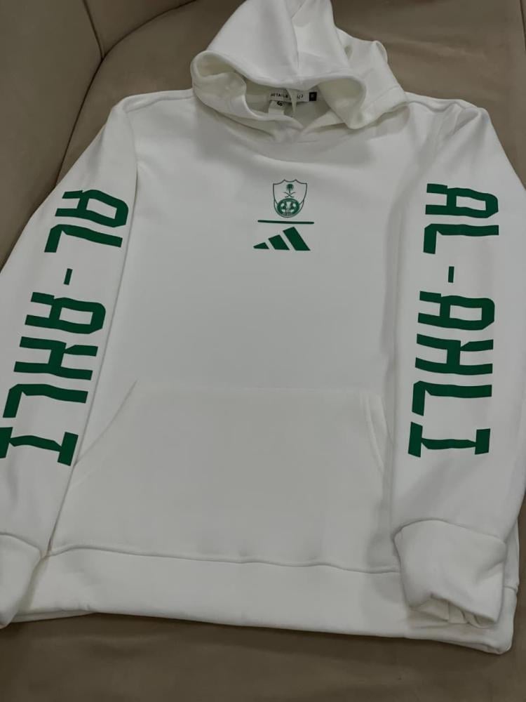 بلوفر الأهلي السعودي الجديد تصميم فاخر وألوان الأخضر والأبيض المميزة