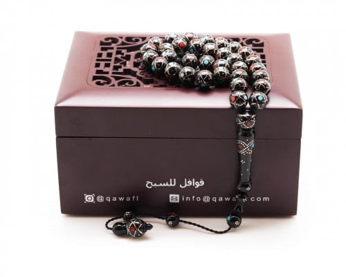 قوافل سبحة خشب الكوك مطعمة بالمرجان و الفيروز و ال...