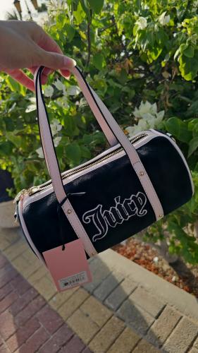 شنطة ماركة جوسي كوتور