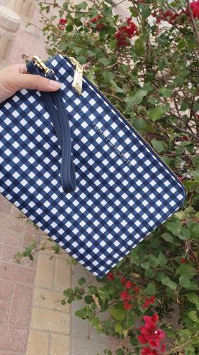 باوتش ماركة تومي هيلفيقر