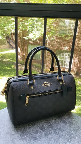 شنطة ماركة كوتش