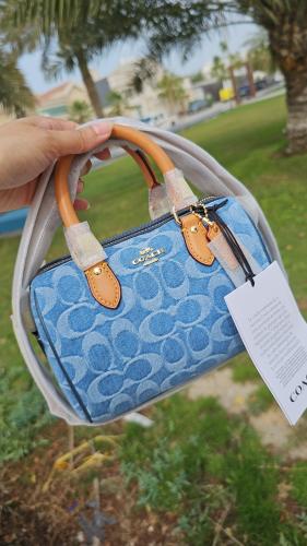 شنطة ماركة كوتش