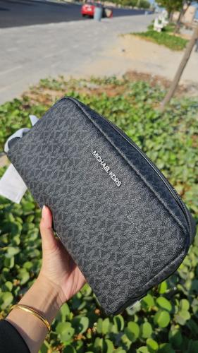 شنطة يد رجالية ماركة مايكل كورس