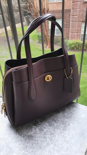 شنطة ماركة كوتش