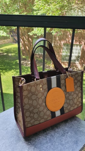 شنطة ماركة كوتش