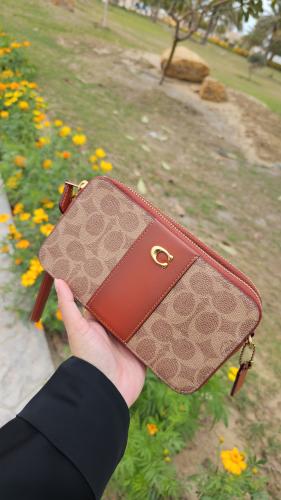 شنطة صغيرة ماركة كوتش