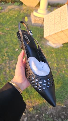 كعب ماركة مايكل كورس