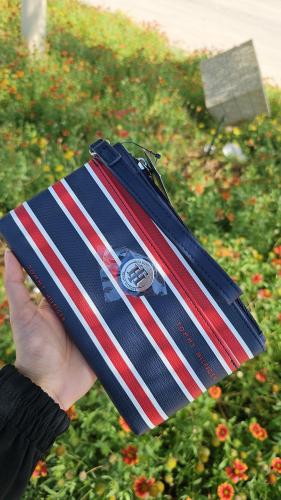 باوتش ماركة تومي هيلفيقر