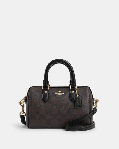 شنطة ماركة كوتش ميني