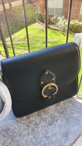 شنطة ماركة كوتش