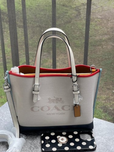 شنطة ماركة كوتش