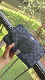 شنطة يد ماركة كوتش