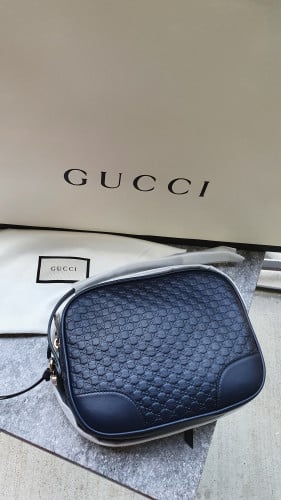 شنطة ماركة قوتشي