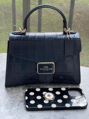 شنطة ماركة كوتش