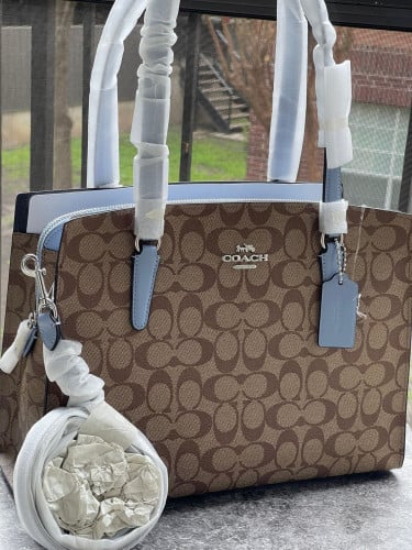 شنطة ماركة كوتش