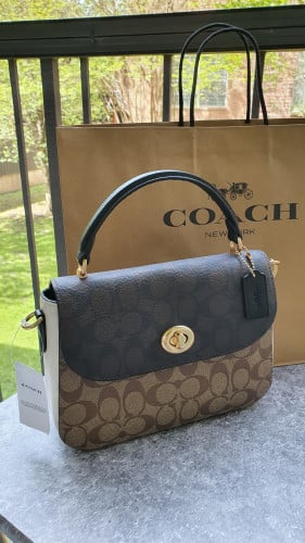 شنطة ماركة كوتش