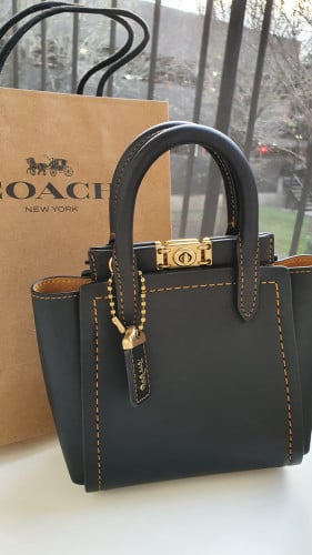 شنطة ماركة كوتش