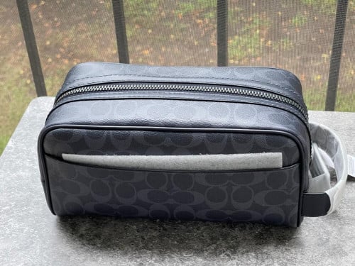 شنطة يد ماركة كوتش