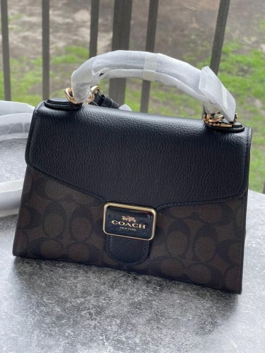 شنطة ماركة كوتش