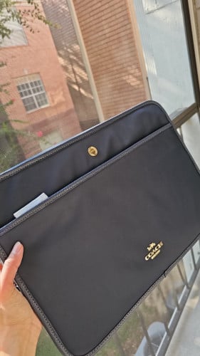 شنطة لابتوب ماركة كوتش