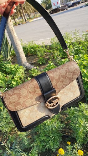 شنطة ماركة كوتش