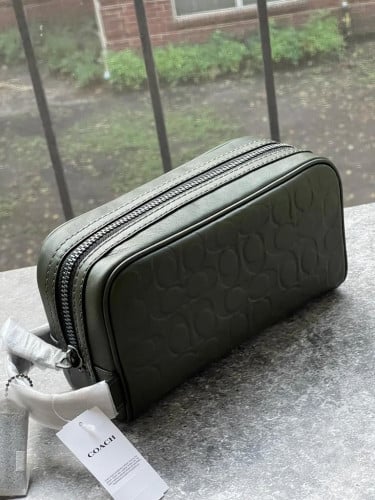 شنطة يد رجالية ماركة كوتش