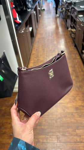 شنطة ماركة تومي هيلفيقر